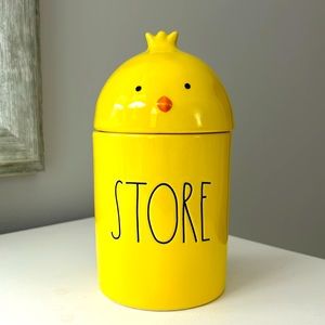Rae Dunn Canister that says STORE .  8 inches in height and 4 inches round.